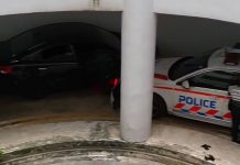 Car Crashed into Stationary Police Car in Tight Multi-Storey Carpark Ramp While Escaping from Another Police Car