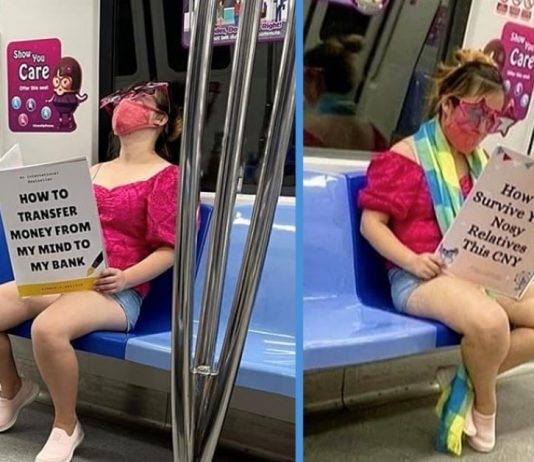 Woman Spotted With Funny Oversized Book Titles in MRT Trains Was Doing a Social Experiment