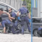 man-tries-bite-police-officers