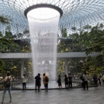 Tian Tian’s Jewel Flagship Opens Today, With 88 Free Chicken Rice Packets Indoor waterfall and forest canopy at Jewel Changi Airport