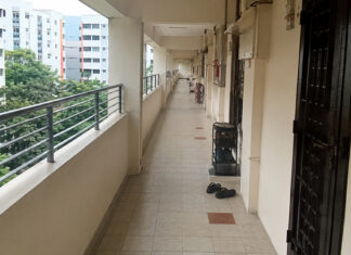 An HDB corridor in Tampines, where a neighbour-noise mediation pilot is now being expanded nationwide
