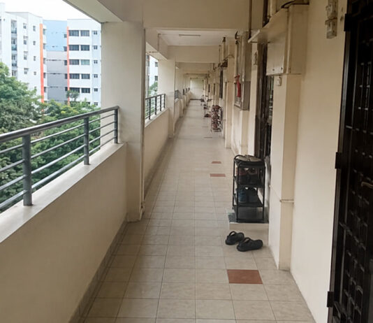 An HDB corridor in Tampines, where a neighbour-noise mediation pilot is now being expanded nationwide