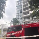 Ang Mo Kio HDB Flat Fire Sends 3 to Hospital, Including Firefighter; About 20 Residents Evacuated SCDF fire engine and charred unit at Block 254 Ang Mo Kio Avenue 4 fire (SCDF via 8world)