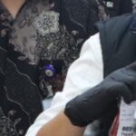 Singaporean Woman, 21, Allegedly Caught in Batam With About 40 Etomidate Vape Cartridges Hidden in Underwear Close-up of seized etomidate vape cartridges in an evidence bag from a Barelang police press conference in Batam