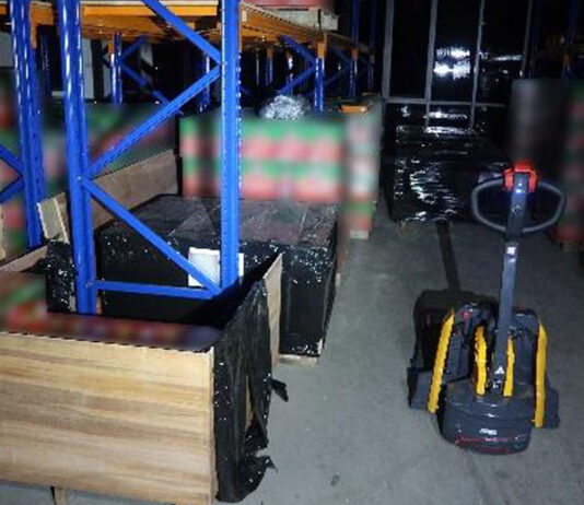 Man Fined S$560,000 for Evading Duty on 28,236 Bottles of Beer Falsely Declared as Food or Machinery Duty-unpaid beer cartons seized by Singapore Customs at Tagore Lane