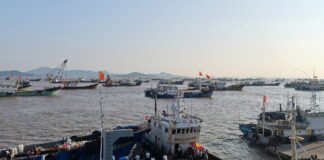 Fishing boats moored in Shenjiamen fishing harbor, Zhoushan, Zhejiang