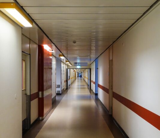 Hospital corridor illustration for Hebei labour dispute brain haemorrhage vegetative case