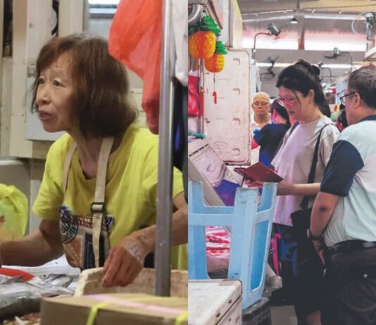 Clementi wet market fish seller at her stall and market aisle, Shin Min photos