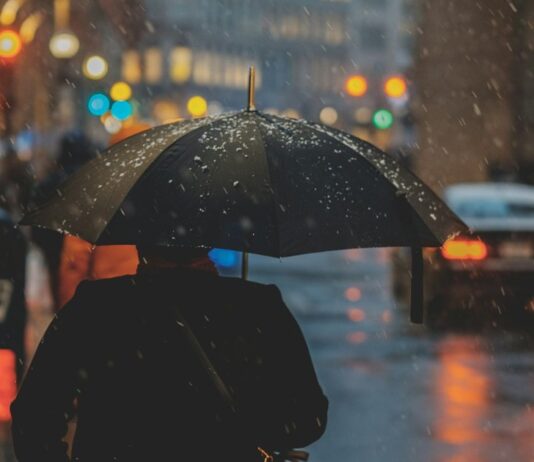 Singapore Cools to Below 25°C a Day After Joint-Highest September Temperature of 35.8°C Rainy Singapore street scene after sudden cool weather