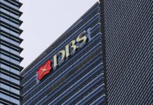 DBS Sued for S$1.298 Billion in 1MDB-Linked Claim, Bank Says It Will Fight Case DBS Bank headquarters tower in Singapore