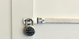 Non-literal padlock stock for a reported shop break-in arrest — not the East Coast Road shop