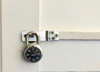 Non-literal padlock stock for a reported shop break-in arrest — not the East Coast Road shop