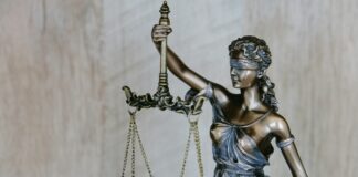 Non-literal courthouse scales and paperwork motif for elderly divorce maintenance judgment with no identifiable faces