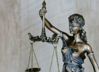 Non-literal courthouse scales and paperwork motif for elderly divorce maintenance judgment with no identifiable faces