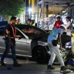 Damaged Mercedes at Esplanade crash scene after mounting kerb and hitting tourists; suspected drink-driving arrest
