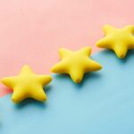 Five yellow stars illustrating online star ratings and fake review crackdowns