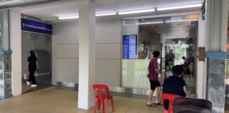 Healthway Medical clinic corridor in Singapore where residents seek flu vaccinations