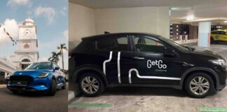 GetGo carsharing cars, including a blue Suzuki Swift and a branded Honda in a carpark