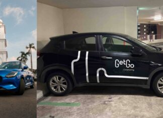 GetGo carsharing cars, including a blue Suzuki Swift and a branded Honda in a carpark