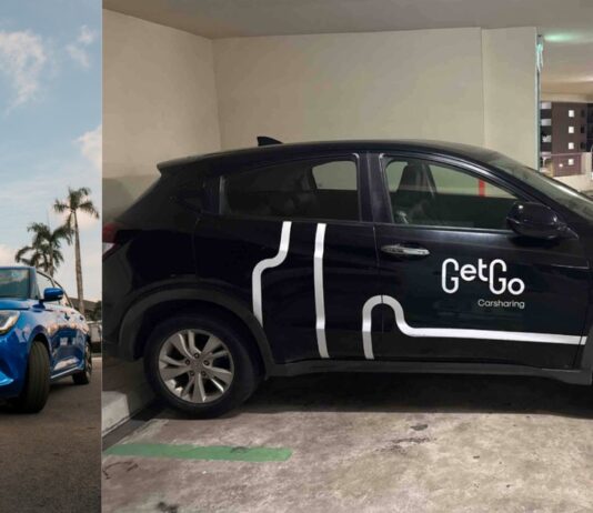GetGo carsharing cars, including a blue Suzuki Swift and a branded Honda in a carpark