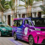 Grab and WeRide Ai.R autonomous shuttle in Singapore with GrabCab behind
