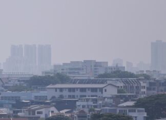 Hazy rooftops over a Singapore residential estate during the late August haze episode