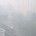 Hazy Singapore skyline illustrating regional smoke haze and moderate air quality