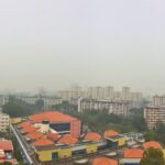 Hazy sky over Singapore illustrating unhealthy air quality
