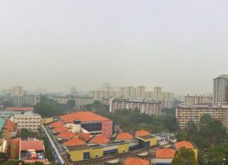 Hazy sky over Singapore illustrating unhealthy air quality