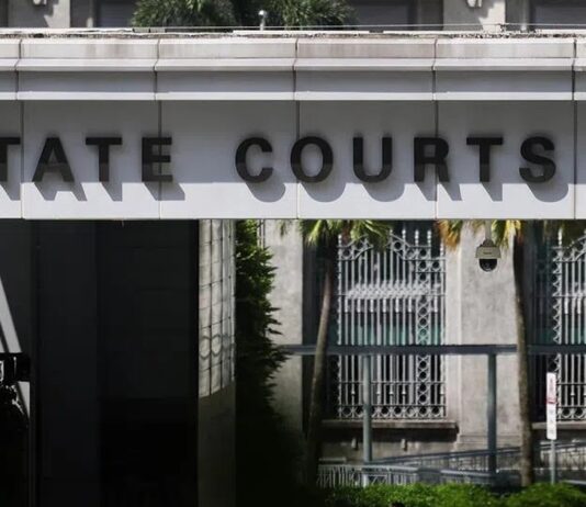 Man Asks Friend to Bring S$50,000 Cash to Hotel Room, Grabs It and Runs; Jailed 8 Months Exterior of the State Courts of Singapore