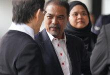 Malaysia Ex-Minister Jamil Khir Charged Over Alleged Misappropriation of RM860 Million in Tabung Haji Funds Former Malaysian minister Jamil Khir Baharom outside court over Tabung Haji charges