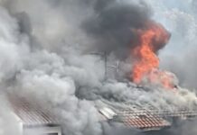 30 Evacuated After Kovan Landed Home Catches Fire, One Taken to Hospital Simon Lane Kovan house fire with flames and smoke from roof
