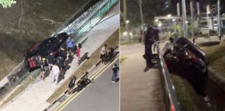Car wedged in Marsiling roadside drain after alleged self-skid; driver left scene
