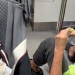 TikTok aftermath still of stranger on MRT floor beside toddler stroller after alleged half-eaten bun incident