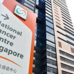 National Cancer Centre Singapore building and directional sign