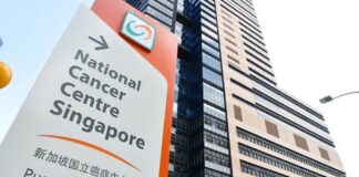 National Cancer Centre Singapore building and directional sign