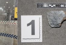 Man, 44, Allegedly Throws Almost Half-Kilogram Rock Twice at Police Cantonment Complex Door, Shattering Glass Shattered glass door at Police Cantonment Complex after rock-throwing vandalism incident