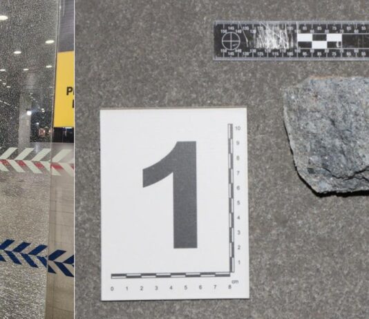 Shattered glass door at Police Cantonment Complex after rock-throwing vandalism incident