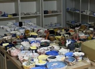 Unfinished pottery pieces left on tables and shelves at a Chinatown pottery studio