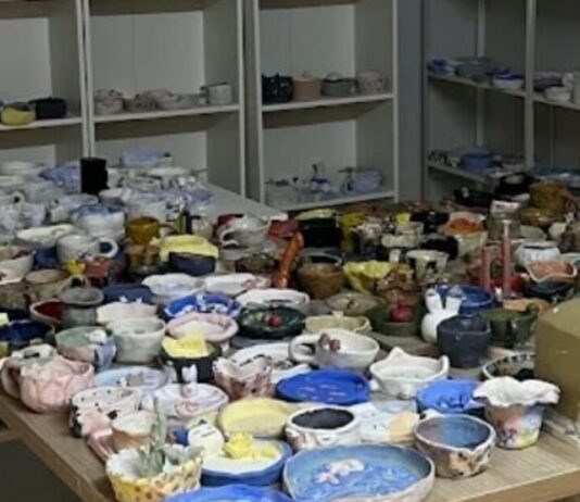 Unfinished pottery pieces left on tables and shelves at a Chinatown pottery studio