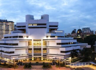 Family Justice Courts building in Singapore at dusk