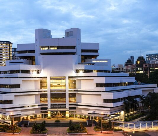 Family Justice Courts building in Singapore at dusk