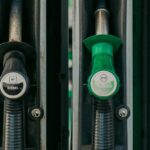 Diesel and unleaded petrol pump nozzles at a fuel station after Singapore price rise
