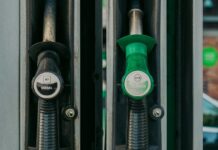 Singapore Pump Prices Rise 8 to 12 Cents; Diesel Tops S$4 a Litre at Major Retailers Diesel and unleaded petrol pump nozzles at a fuel station after Singapore price rise