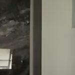 Dangling bathroom electrical wires during unfinished home renovation