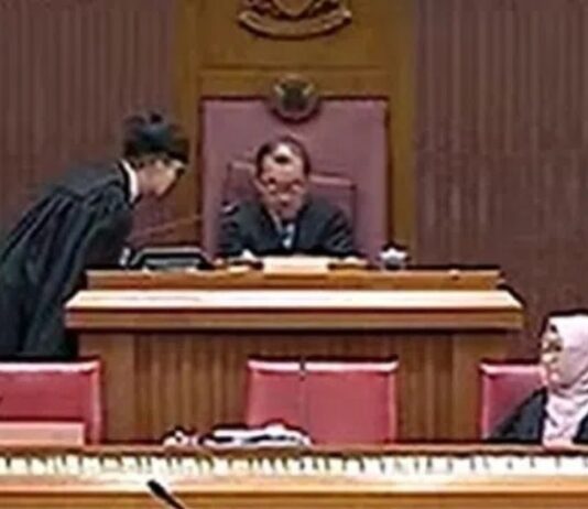 Parliament livestream still of Speaker Seah Kian Peng appearing to nod off in the Speakers chair