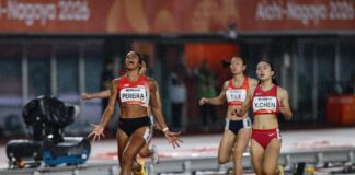 Singapore sprinter Shanti Pereira celebrating Asian Games 200m gold