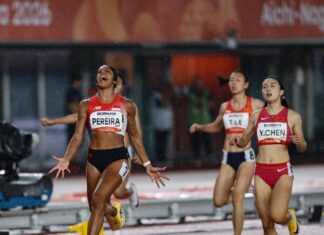 Shanti Pereira Wins Asian Games 200m Gold, Defends Her Title and Makes History Singapore sprinter Shanti Pereira celebrating Asian Games 200m gold