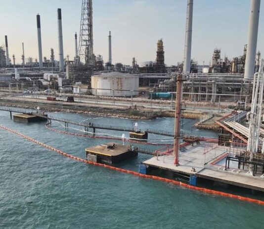 Containment booms deployed at Pulau Bukom after Shell oil leak (MPA/NEA joint photo via CNA host)