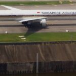 Singapore Airlines Boeing 777 in standard blue and gold livery taxiing at Changi Airport